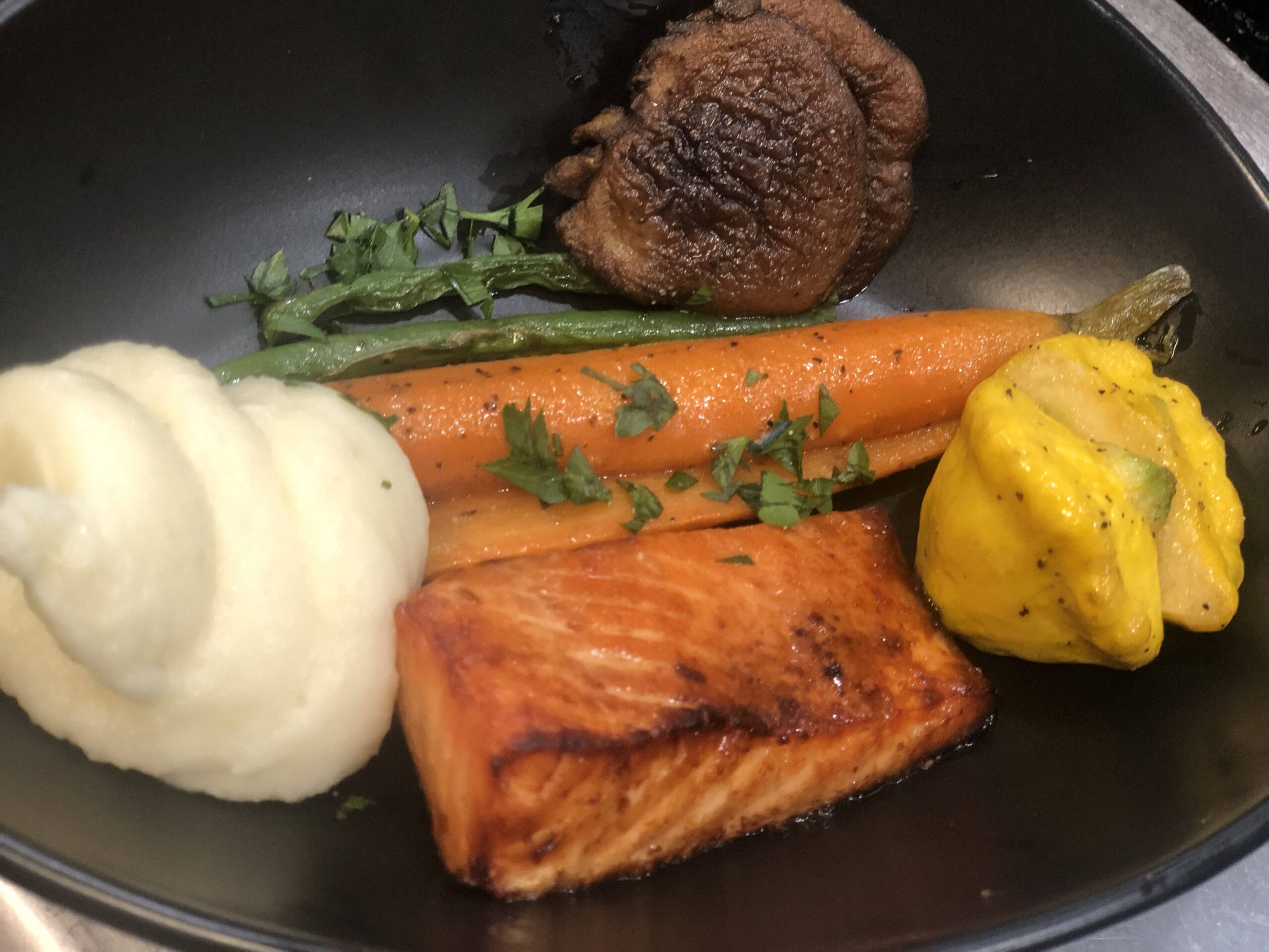 Gitksan Planked Salmon with Berry Barbeque Sauce, Roasted Fennel–Yukon Gold Potato Purée, and Northwest Vegetable Medley