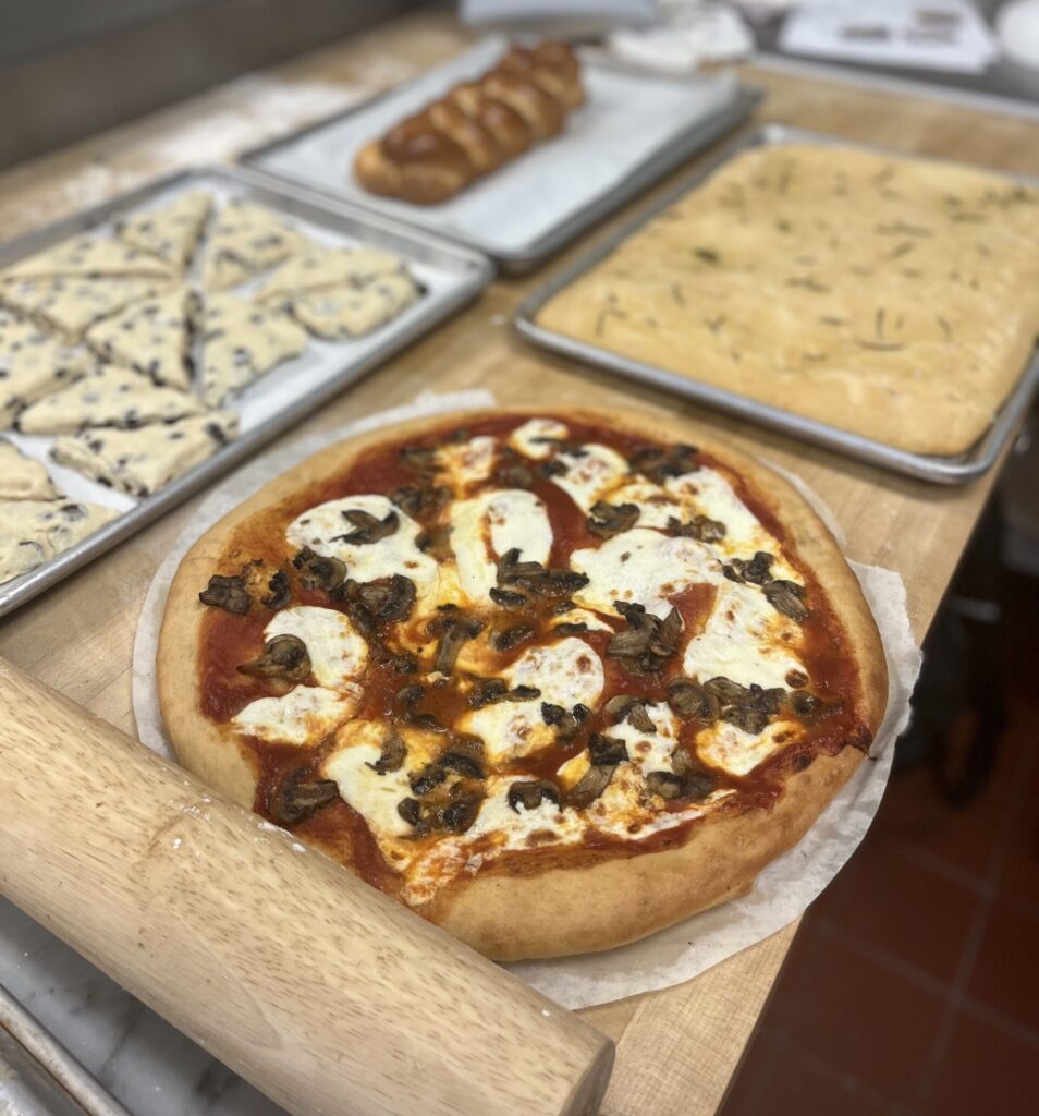 Presentation with Pizza, Focaccia, Scones and Challa.