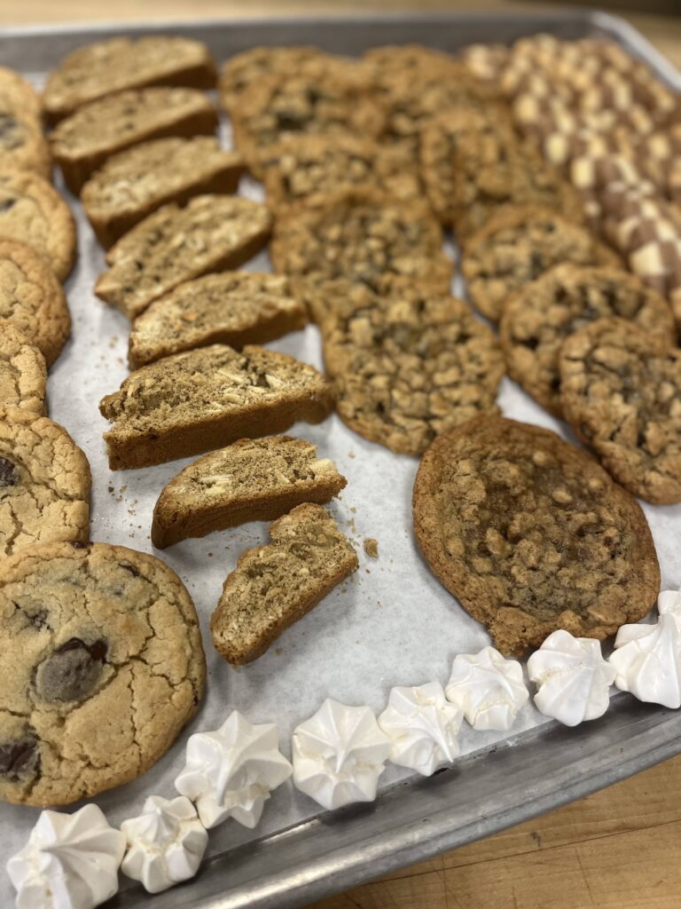 Tray with Chocolate Chip Cookies, Espresso Biscotti, Oatmeal Cookies, Icebox Cookies and some Meringue.